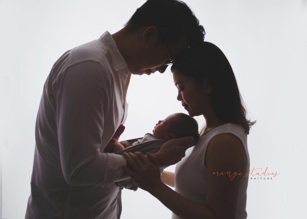 14 days old baby boy with parents newborn portraits in singapore studio
