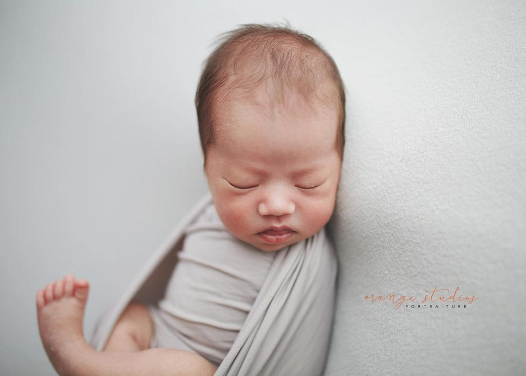 14 days old baby boy newborn portraits in singapore studio natural light