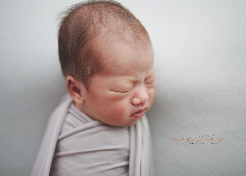 14 days old baby boy newborn portraits in singapore studio natural light