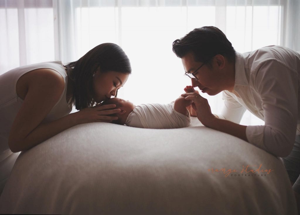 14 days old baby boy with parents newborn portraits in singapore studio