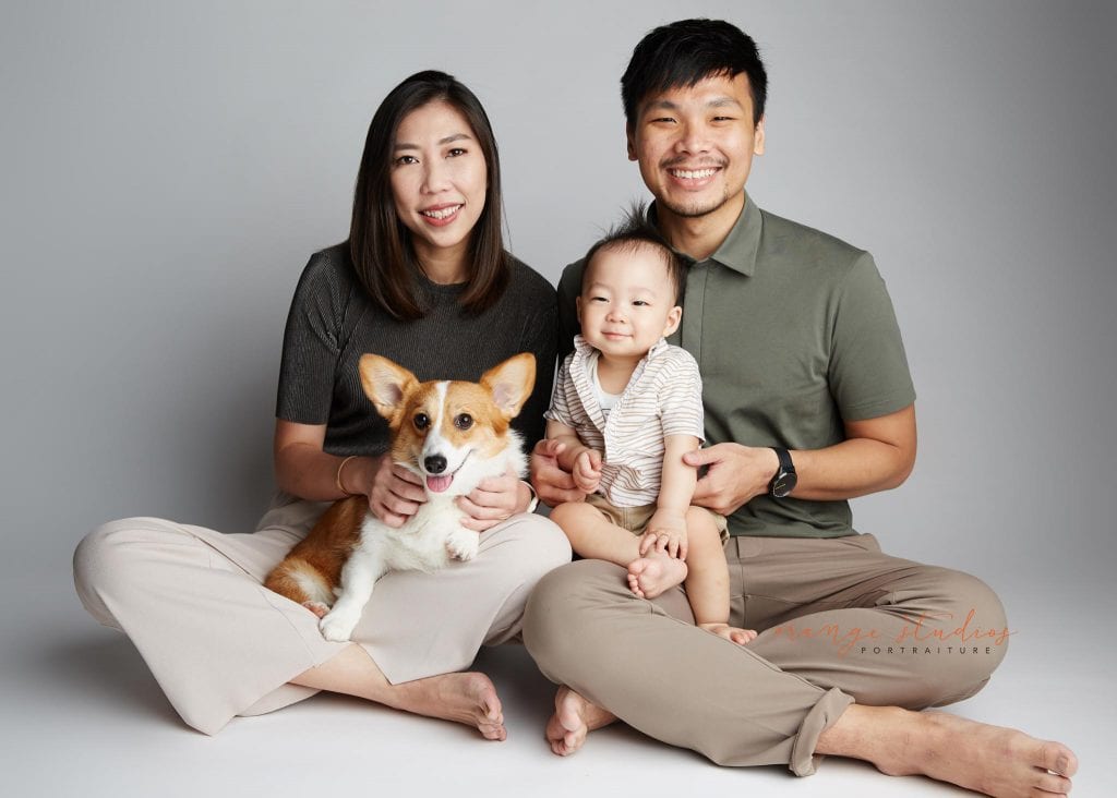 1 year old baby boy with parents and pet dog family portraits in singapore studio