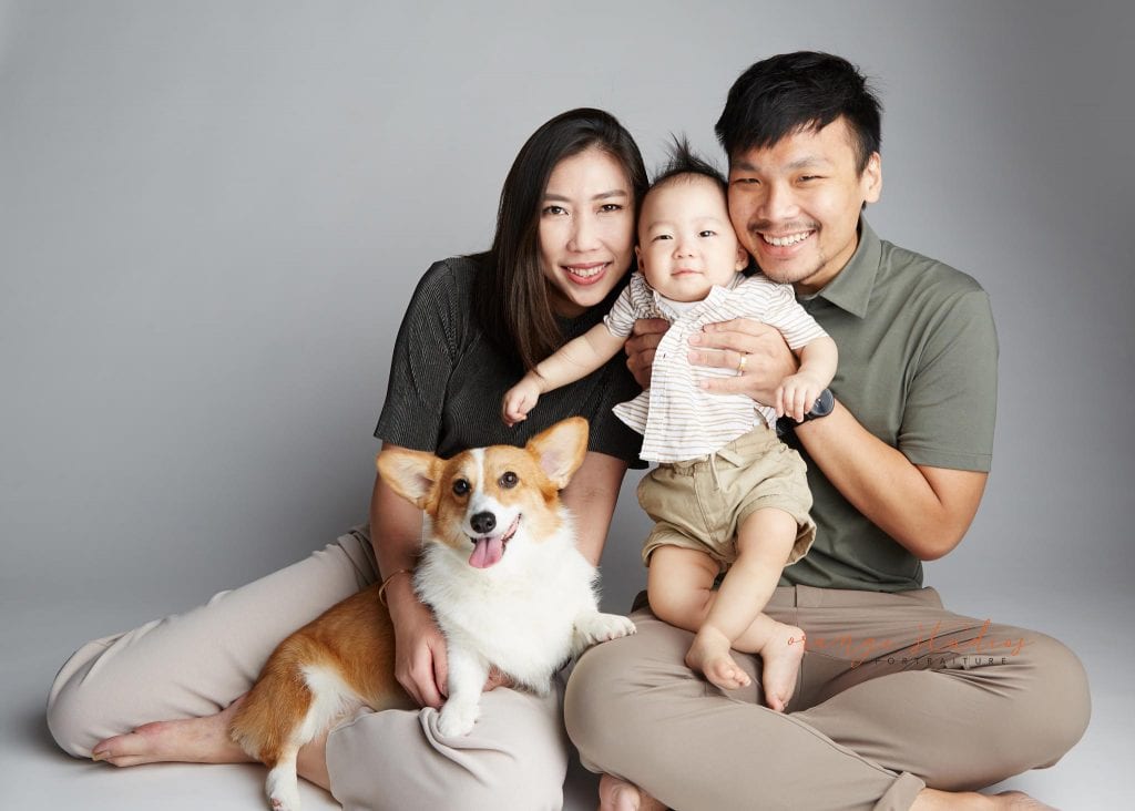 1 year old baby boy with parents and pet dog family portraits in singapore studio