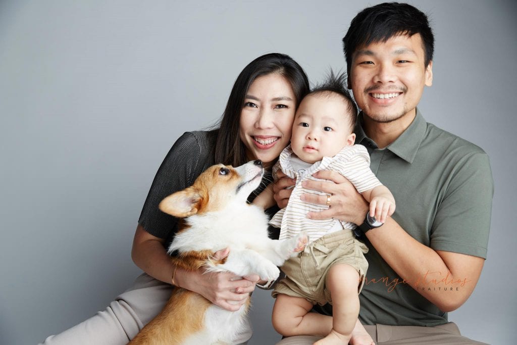 1 year old baby boy with parents and pet dog family portraits in singapore studio