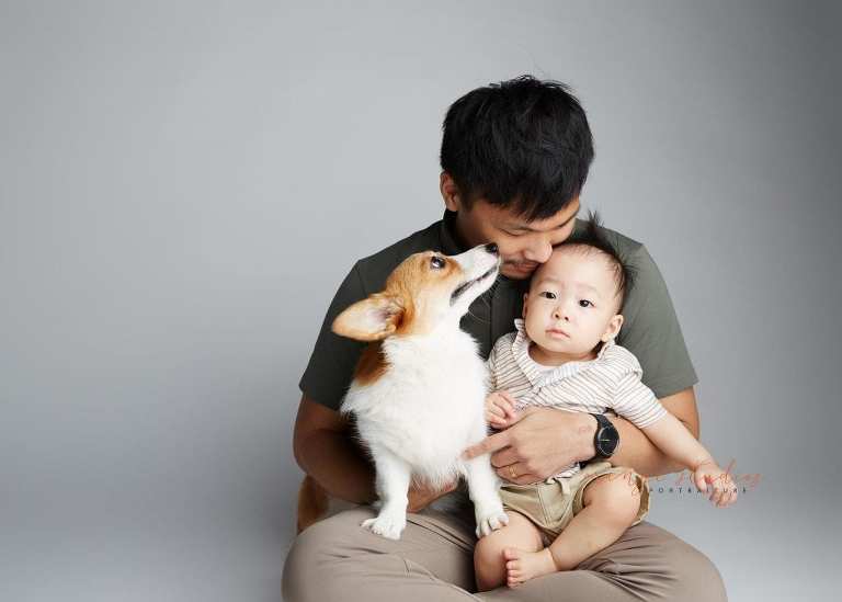 1 year old baby boy with dad and pet dog family portraits in singapore studio