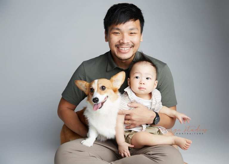 1 year old baby boy with dad and pet dog family portraits in singapore studio