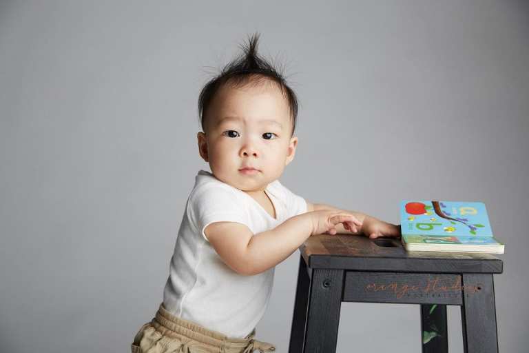 1 year old baby boy standing portraits in singapore studio