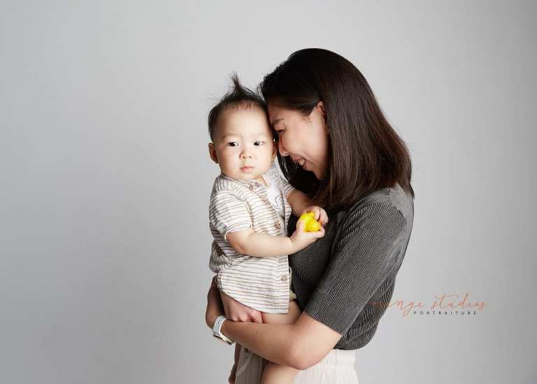 1 year old baby boy with mum family portraits in singapore studio