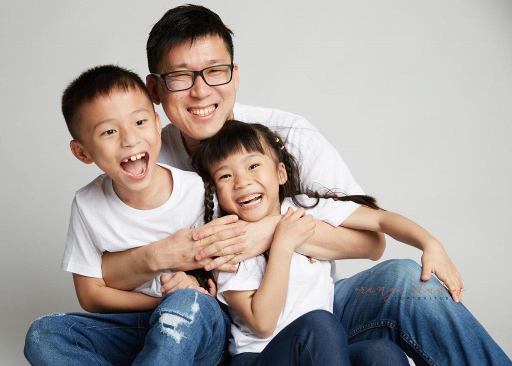 dad and kids family portraits in singapore studio