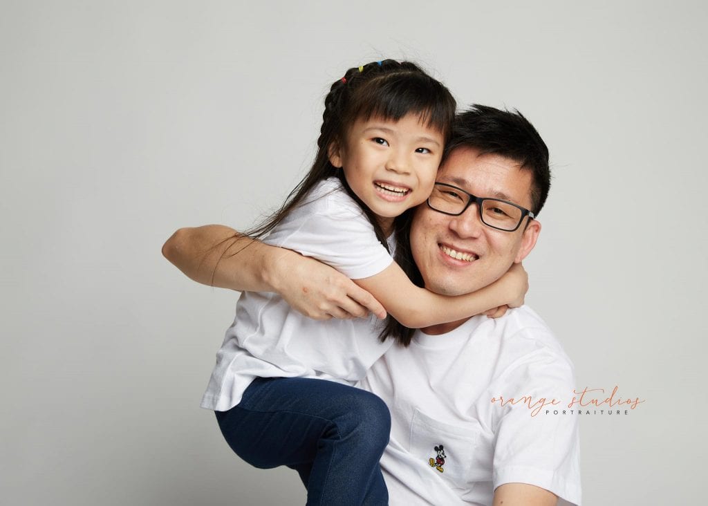 dad and daughter family portraits in singapore studio