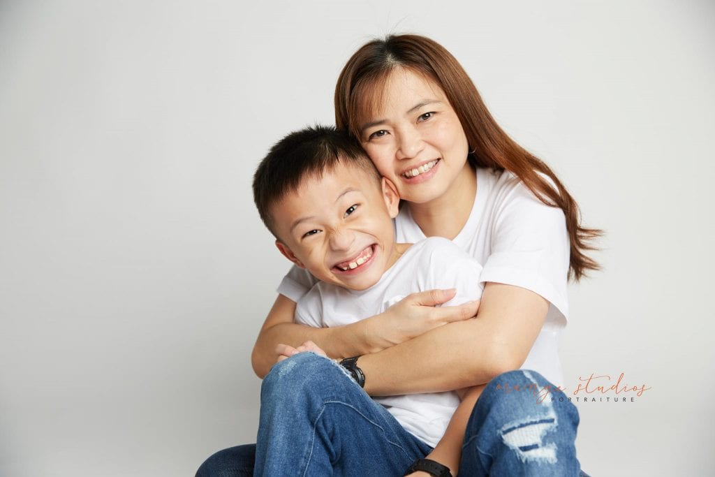 mum and son fun family portraits in singapore studio