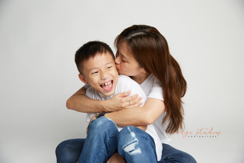 mum and son fun family portraits in singapore studio