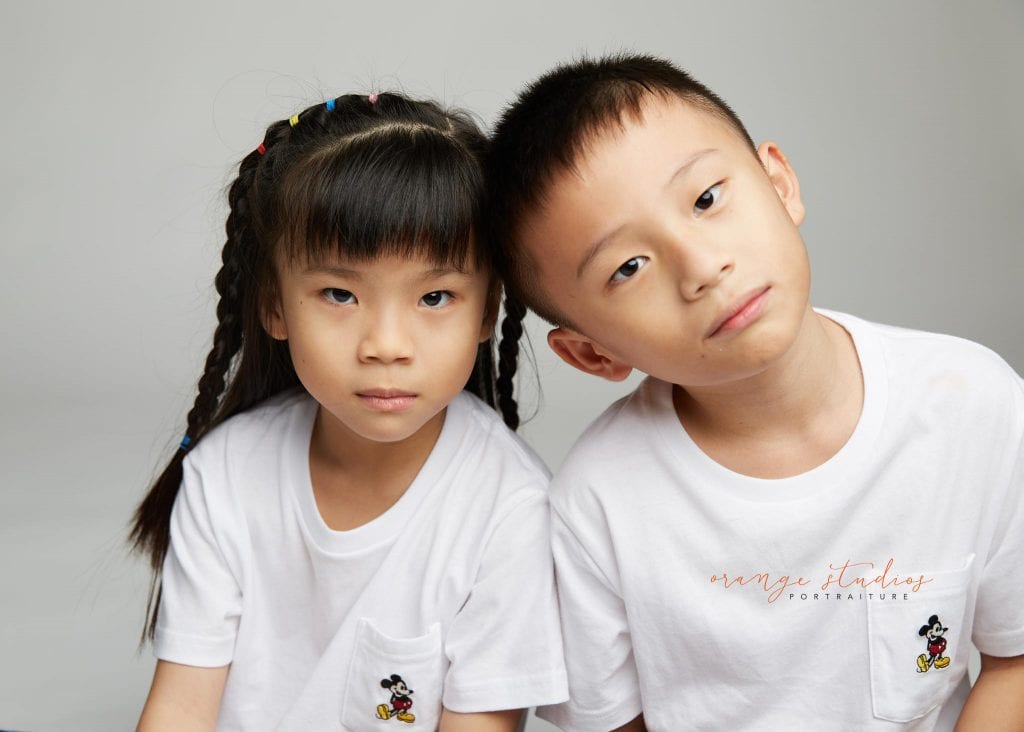 brother and sister siblings portraits in singapore studio