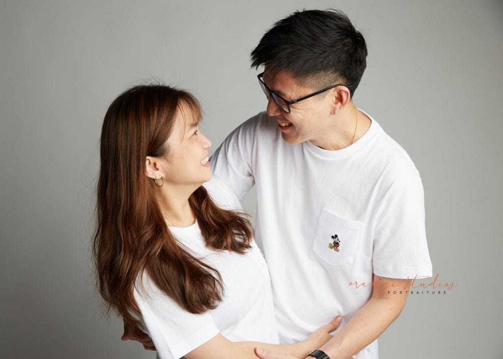 mum and dad 10th wedding anniversary loving couple portraits in singapore studio
