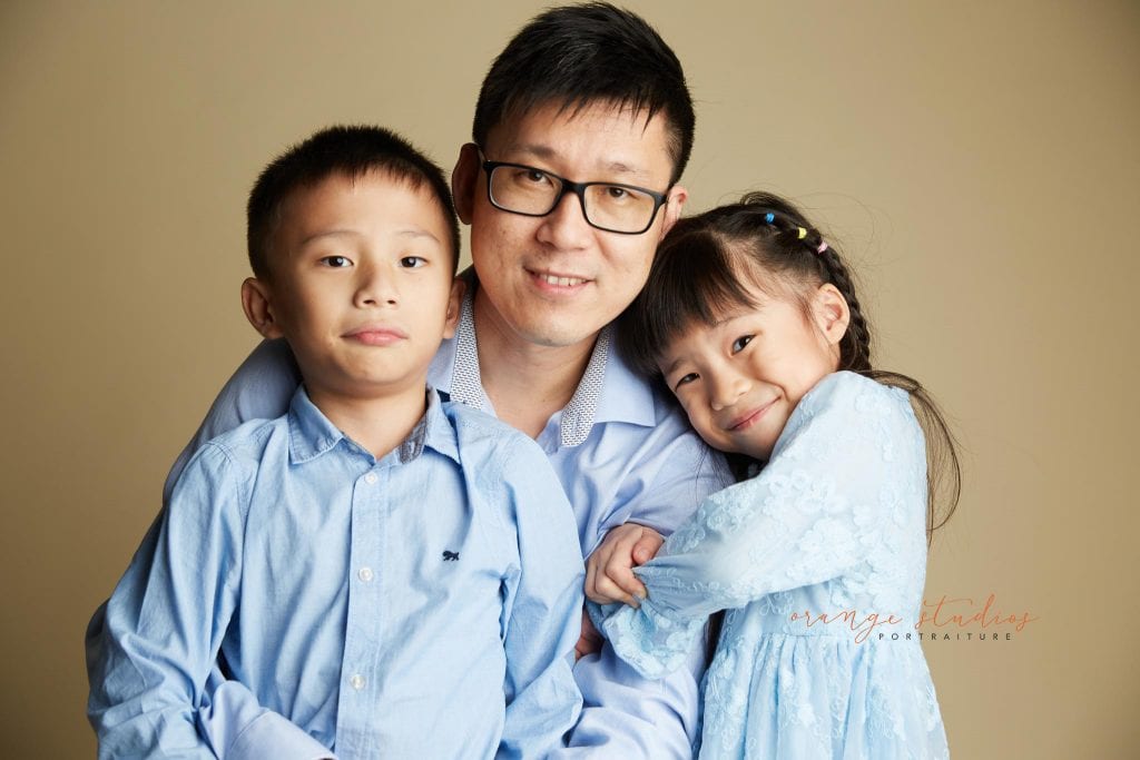 dad and kids family portraits in singapore studio
