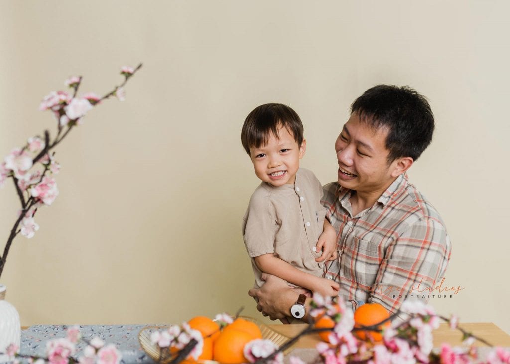 son and dad cny themed portraits in singapore studio