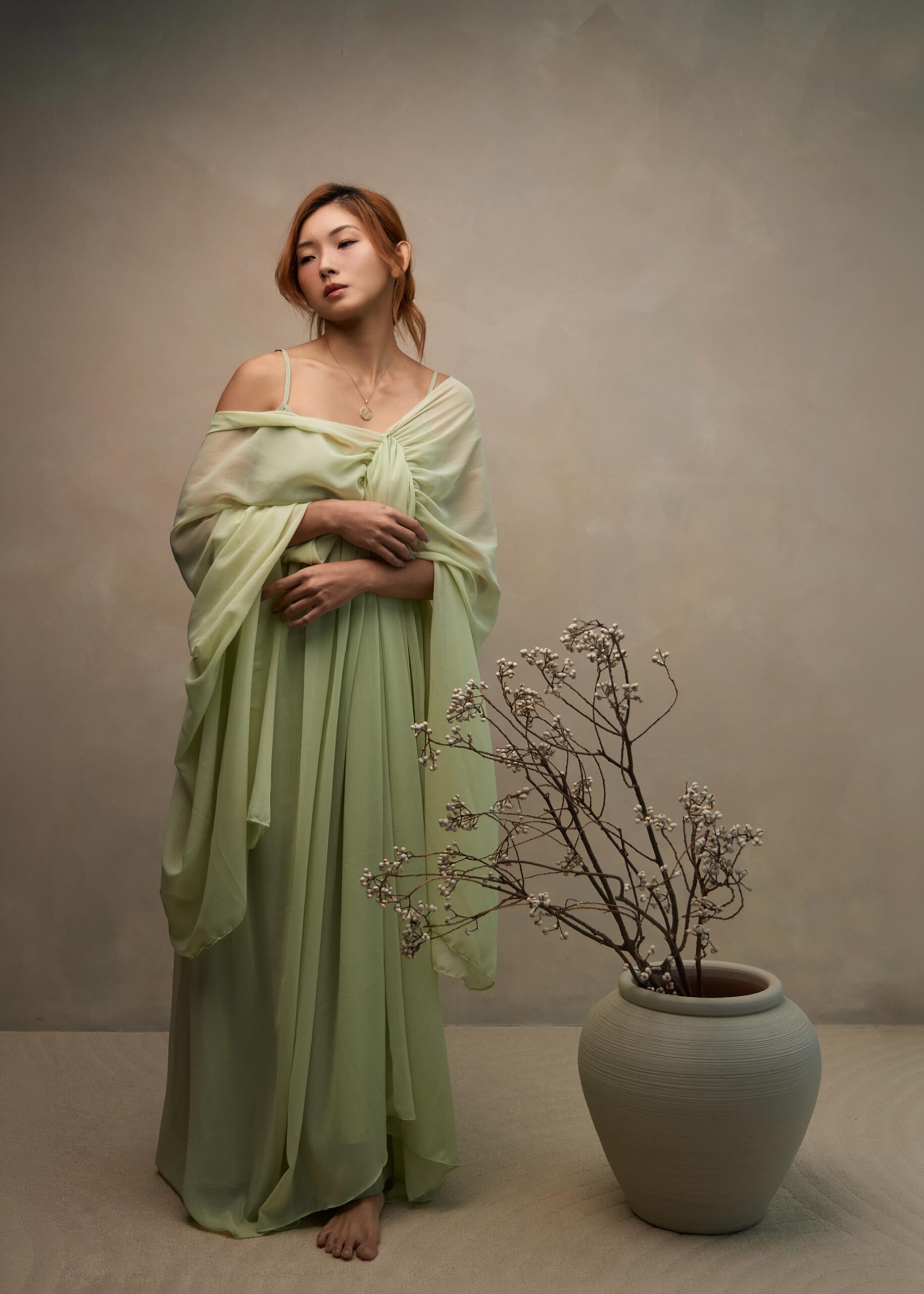 Celadon vase and chrysanthemum styling detail on a 新中式 studio set