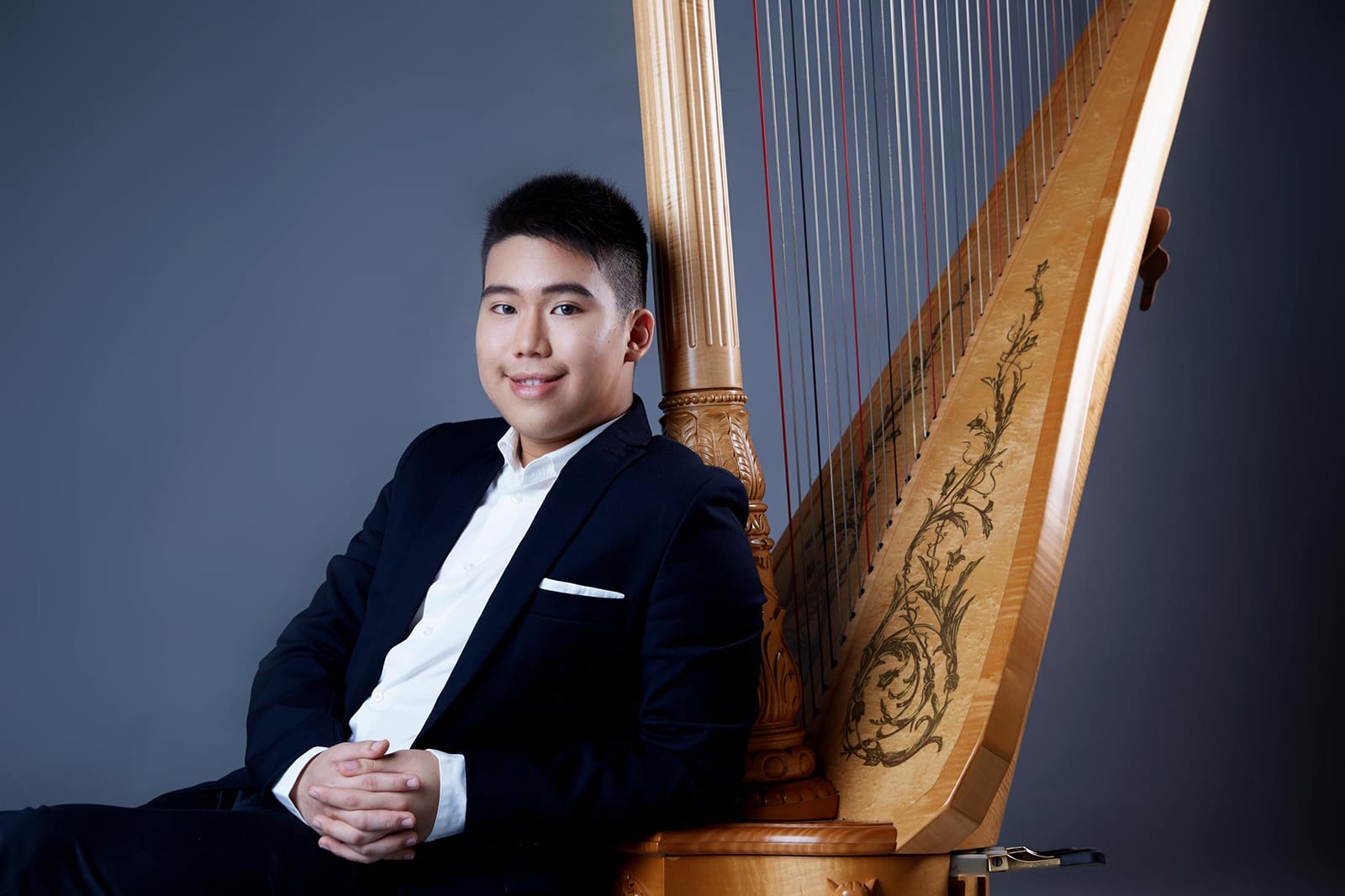 Young harpist studio portrait, Rave Harps x Orange Studios